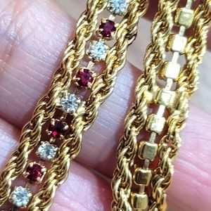 Beautiful Red and white crystal with gold tone tennis bracelet.